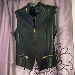 Black leather vest.